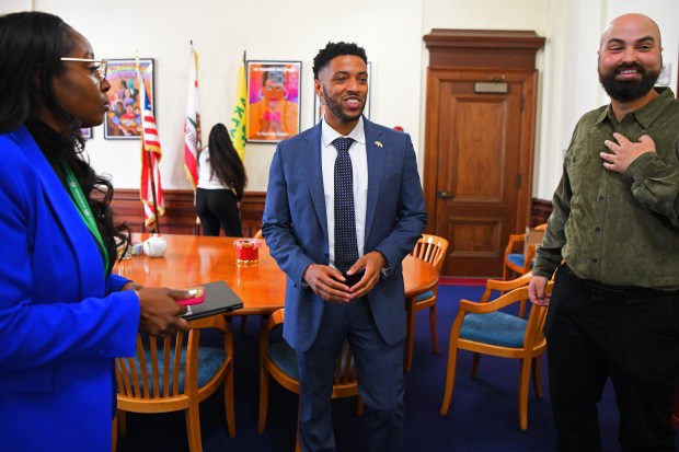 Oakland city council district 6 member Kevin Jenkins, center, talks about his recent selection as the interim mayor of Oakland during the 2025 Inauguration Ceremony held at Oakland City Hall in Oakland, Calif., on Monday, Jan. 6, 2025. (Jose Carlos Fajardo/Bay Area News Group)