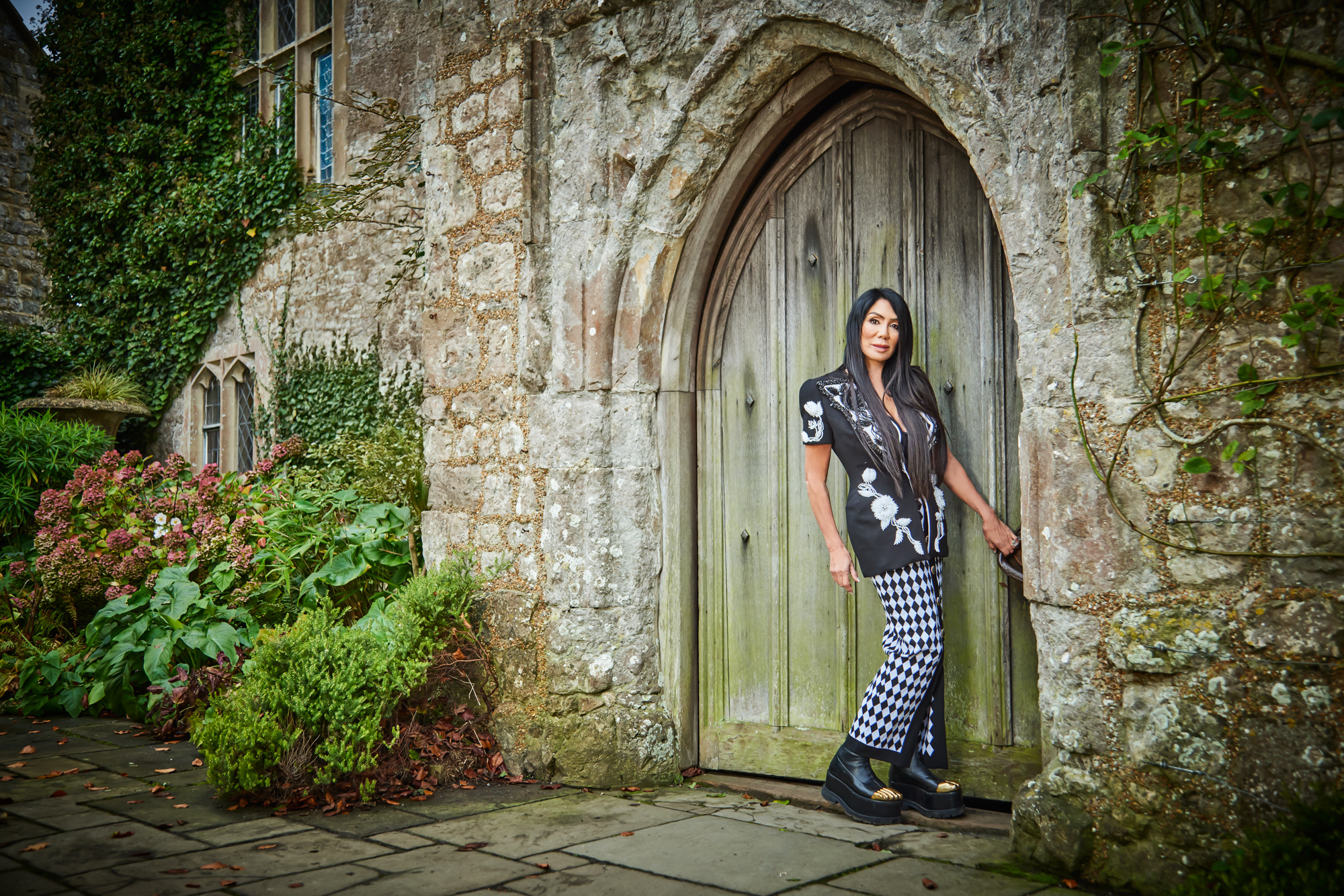 Ann Kaplan Mulholland is pictured by door of Lympne Castle in Kent.