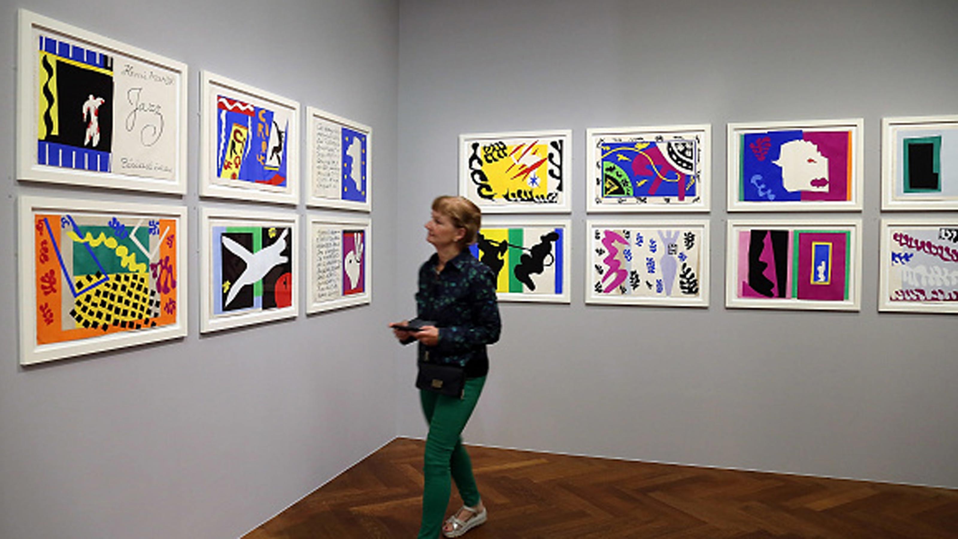 A woman looks at Henri Matisse's "Jazz" series at a gallery in Frankfurt.
