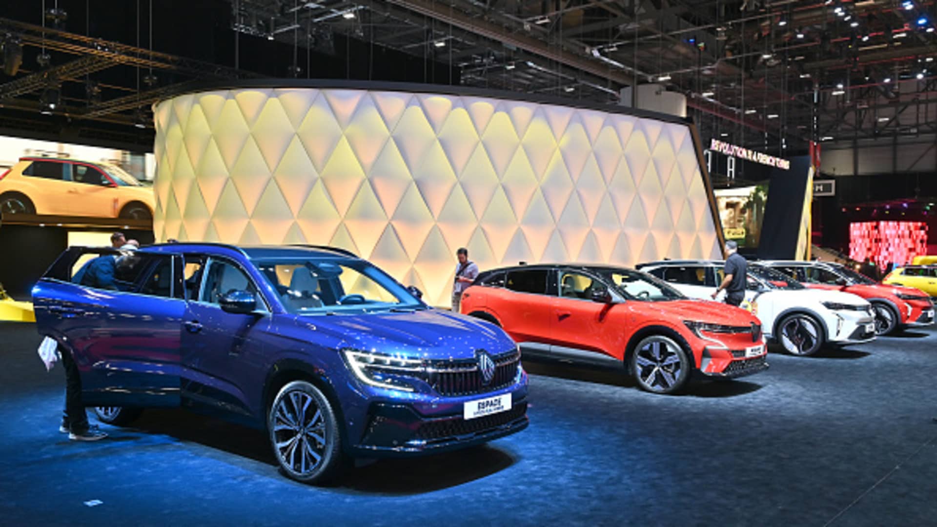 A Renault Espace E-Tech full Hybrid (L) and a Megane E-Tech 100% Electric EV (C) are displayed during the Geneva Motor Show 2024 at Palexpo on Feb. 26, 2024 in Geneva, Switzerland. 