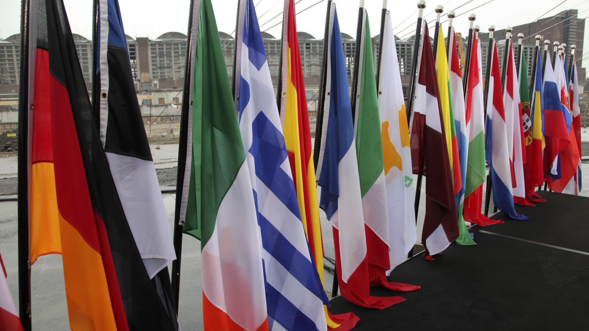 Flags for the European Union members stand during a ceremony to lay a cornerstone for the new European Central Bank (ECB) headquarters in Frankfurt, Germany.