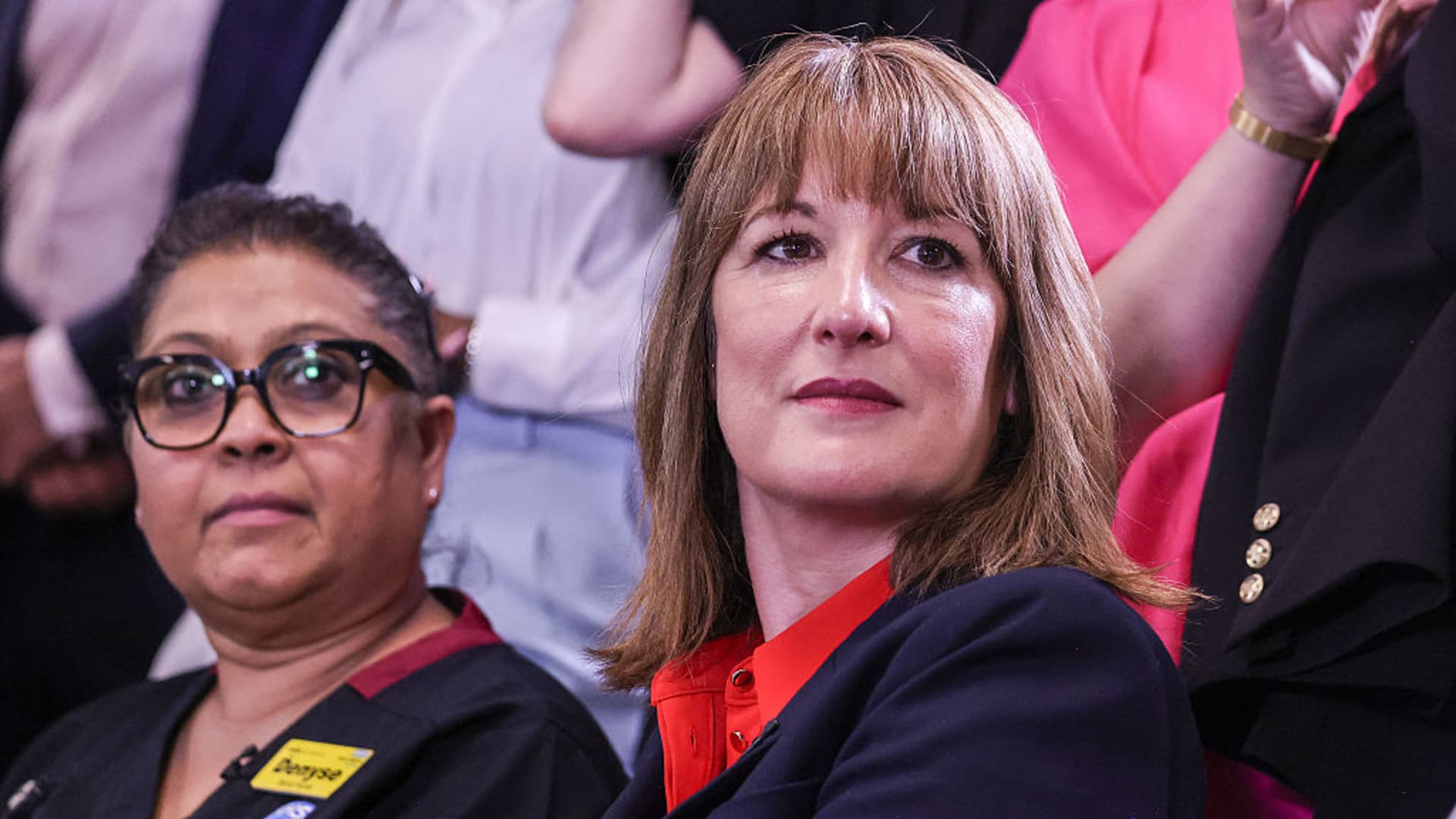 Britain's Chancellor of the Exchequer Rachel Reeves (C) reacts during a visit to the Sir Ludwig Guttmann Health and Wellbeing Centre in east London on July 3, 2025, where they launched the Government's new Health Plan.