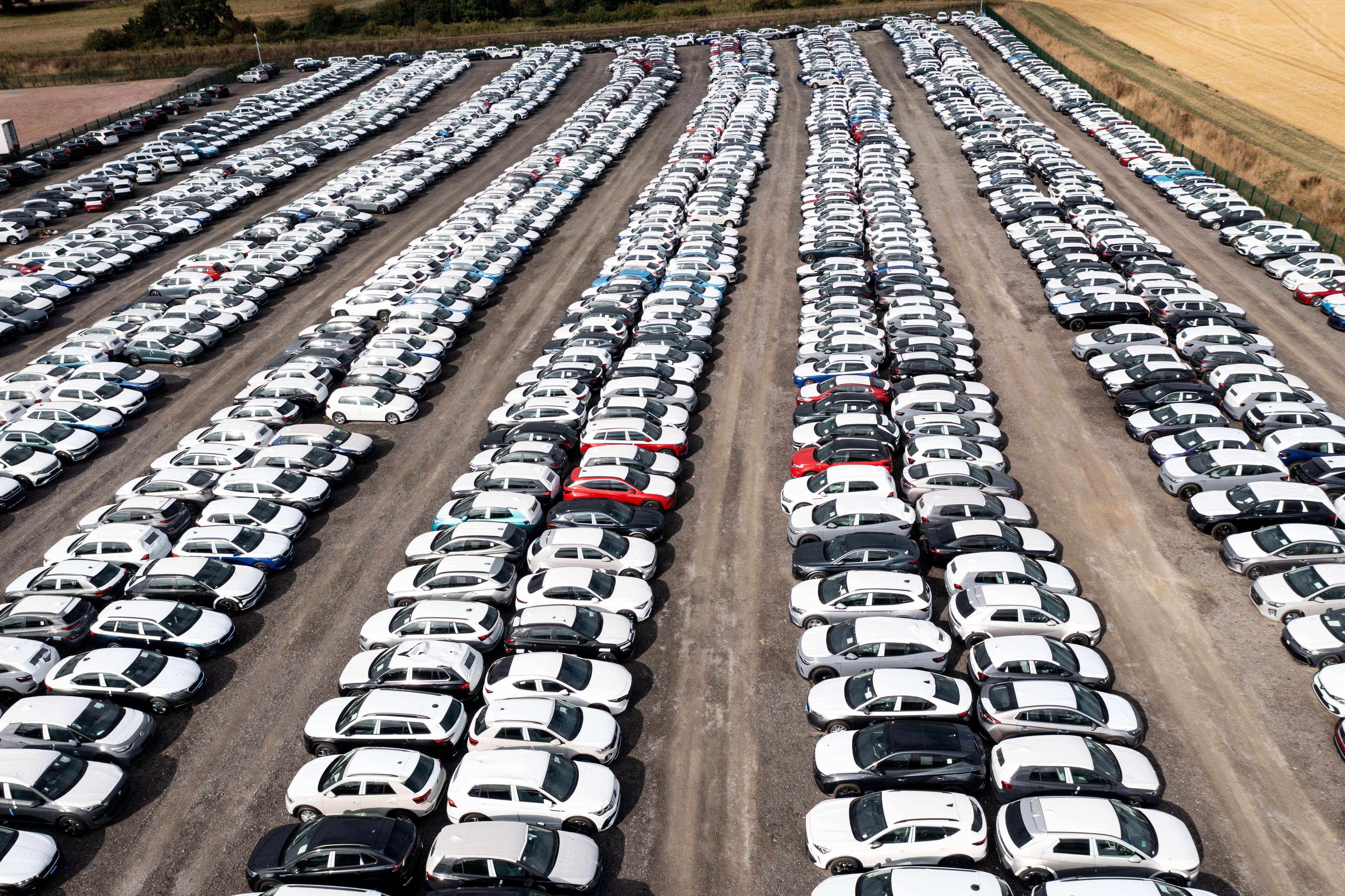 New cars lined up on a lot