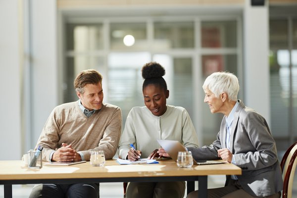 Financial advisor assisting clients.