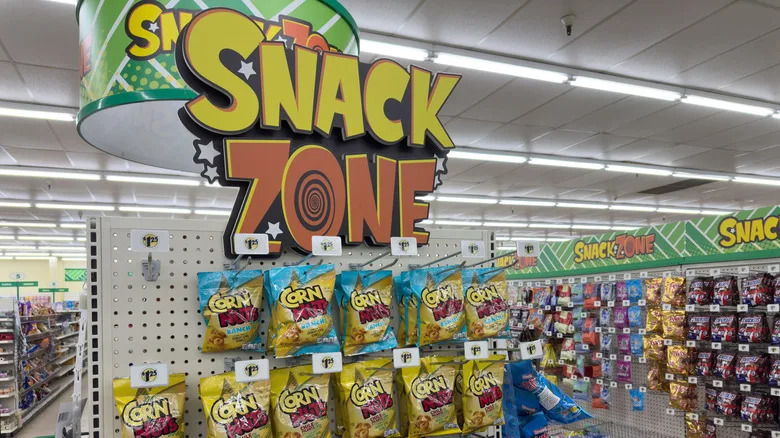 Shelves of processed snacks at a dollar store