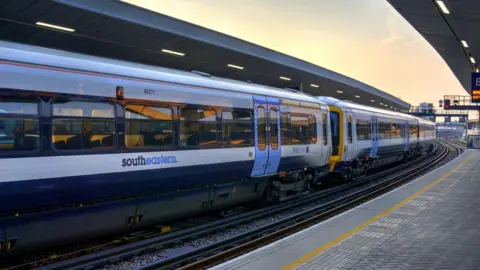 Getty Images A white Southeastern train with blue doors waiting at platform at London Bridge station