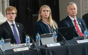  From left, now-former UNL Student Regent Paul Pechous and Regents Elizabeth O’Connor of Omaha and Rob Schafer of Beatrice. Oct. 5, 2023. (Zach Wendling/Nebraska Examiner)