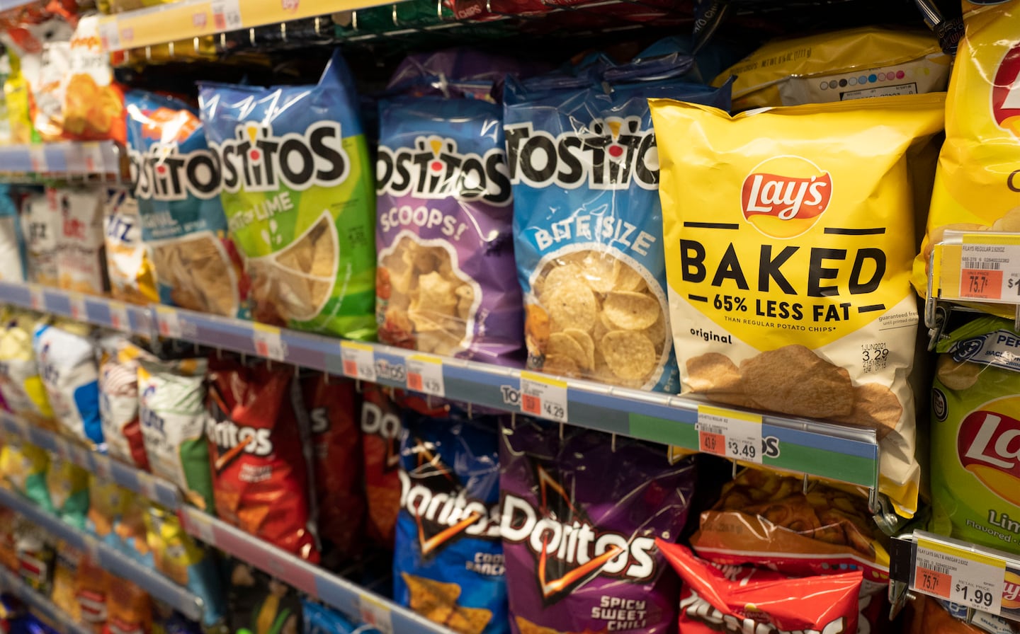 FILE - Potato chips are displayed at a store in New York, March 25, 2021. 