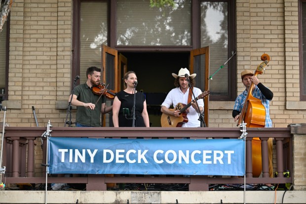 The Tribonacci Trio plays a "Tiny Deck Concert" at Longmont Public Media during Longmont's Unity in the Community on Friday. (Matthew Jonas/Staff Photographer)