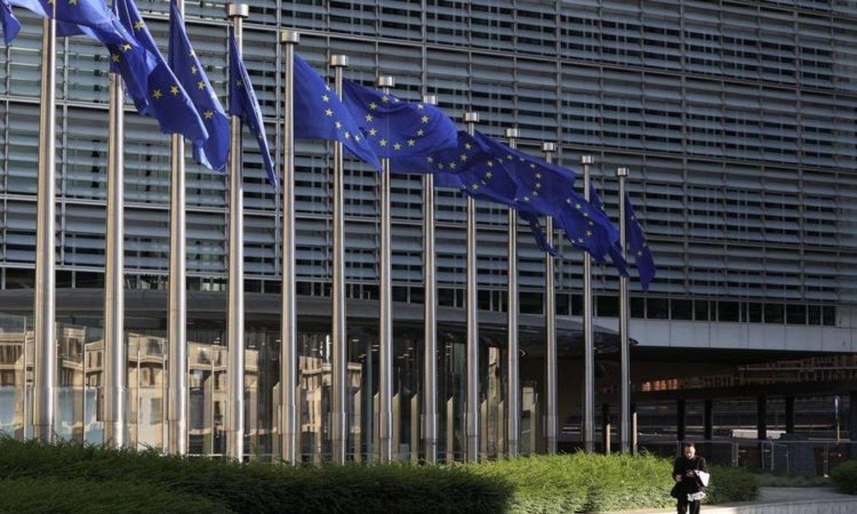 Photo taken on May 23, 2025 shows European Union flags at the European Commission headquarters in Brussels, Belgium. U.S. President Donald Trump on Friday threatened a 50 percent tax on all imports from the European Union as well a 25 percent tariff on Apple products unless iPhones are made in the United States. (Xinhua/Zhao Dingzhe)