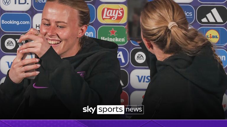 Hannah Hampton answers FaceTime call during presser