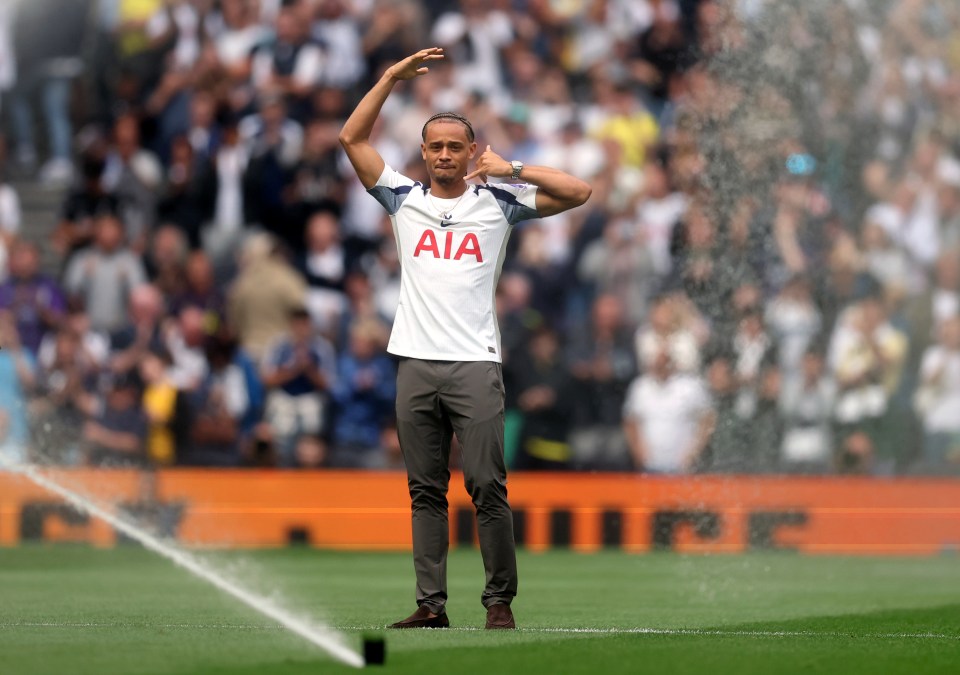 Xavi Simons of Tottenham Hotspur acknowledging fans.