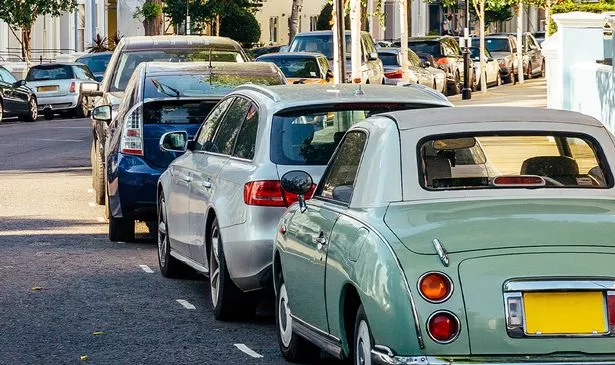 Cars parked on a road