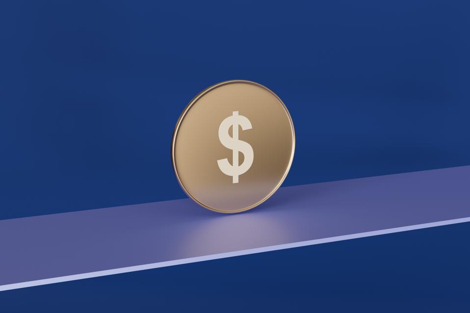 Golden Coin Displayed on Blue Background with Dollar Sign Symbol