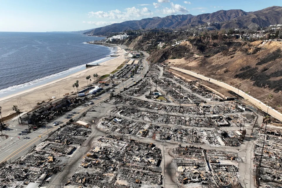 Jae C. Hong/AP - PHOTO: An aerial view shows the devastation left by the Palisades Fire in the Pacific Palisades section of Los Angeles, Jan. 27, 2025.