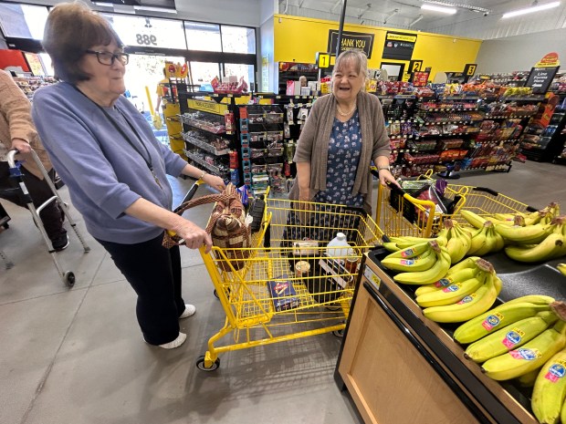 Pamela Recene, 67, and her mother, Barbara Recene, 85, shop...