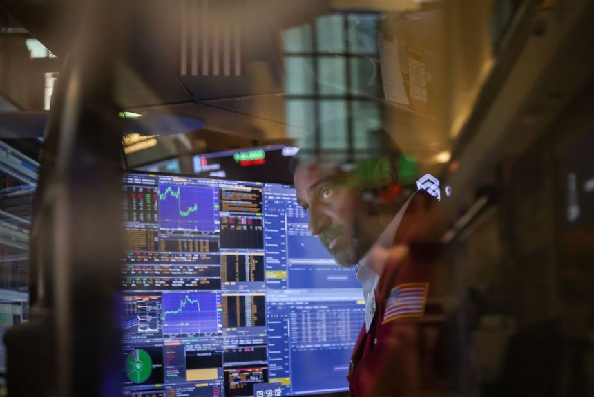 A trader works on the floor at the New York Stock Exchange on September 8, 2025.