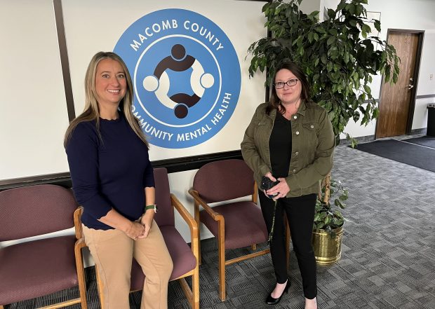 Nicole Gabriel, left, of the Macomb County Office of Substance Abuse, and county Community Corrections Director stand in a hallway/lobby of a Sterling Heights buidling that houses the new county Community Mental Health Engagement Center.JAMESON COOK -- THE MACOMB DAILY