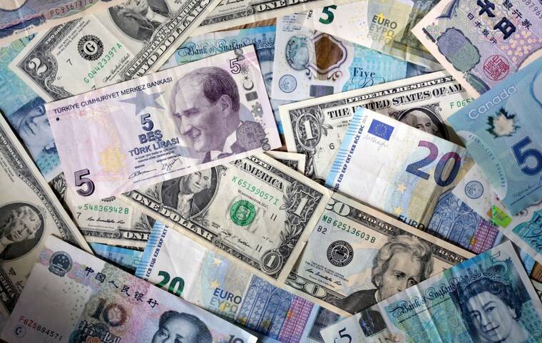 REUTERS/DADO RUVIC/ILLUSTRATION/FILE PHOTO
                                U.S. dollar, Euro, Chinese Yuan, Canadian dollar, Turkish Lira and Pound banknotes are seen in this illustration on May 4.
