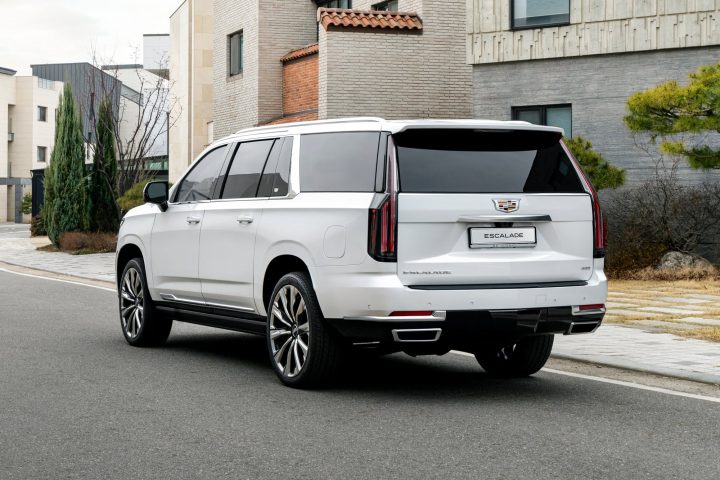 Rear three-quarters view of Cadillac Escalade ESV Premium Luxury Platinum.