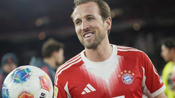 STUTTGART, GERMANY - DECEMBER 06: Harry Kane of FC Bayern Munich poses for a photograph with the match ball after scoring a hat-trick during the Bundesliga match between VfB Stuttgart and FC Bayern München at MHPArena on December 06, 2025 in Stuttgart, Germany. (Photo by F. Noever/FC Bayern via Gett