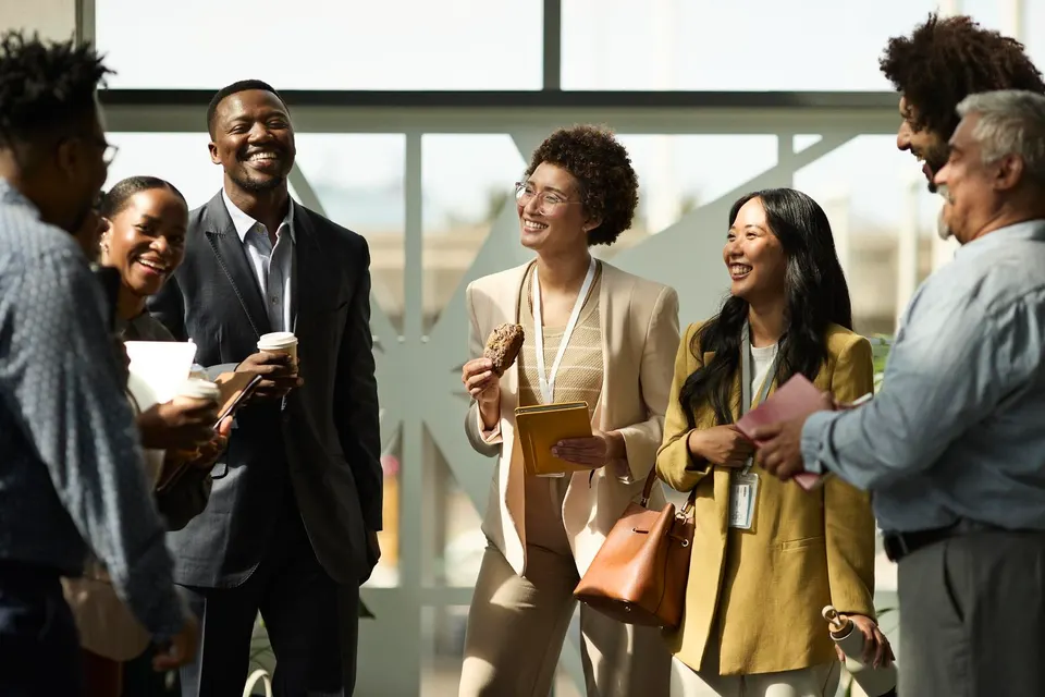 Multiracial business professionals talking in seminar