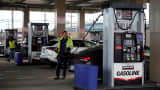 Vehicles have their gasoline tanks filled at a Costco Wholesale store on March 21, 2026, in Bayonne, New Jersey.  
