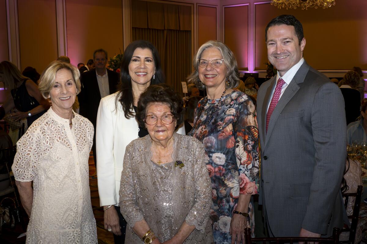 Jinny Dalbeck, back row, from left Marissa Goldberg, Deborah Ferrington and Dr. Benjamin Bert with Mary Catherine Cooper.