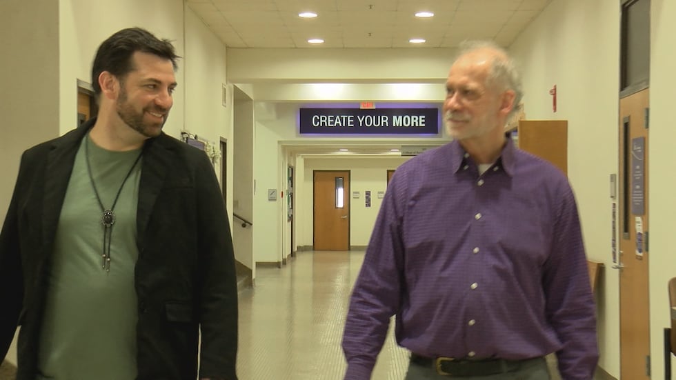 Justin Beatty, Winona State University alum (left) and Winona State University Professor Pat...