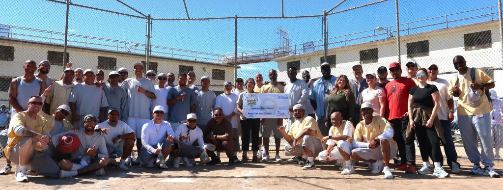 Group photo of the check presentation at CTF.