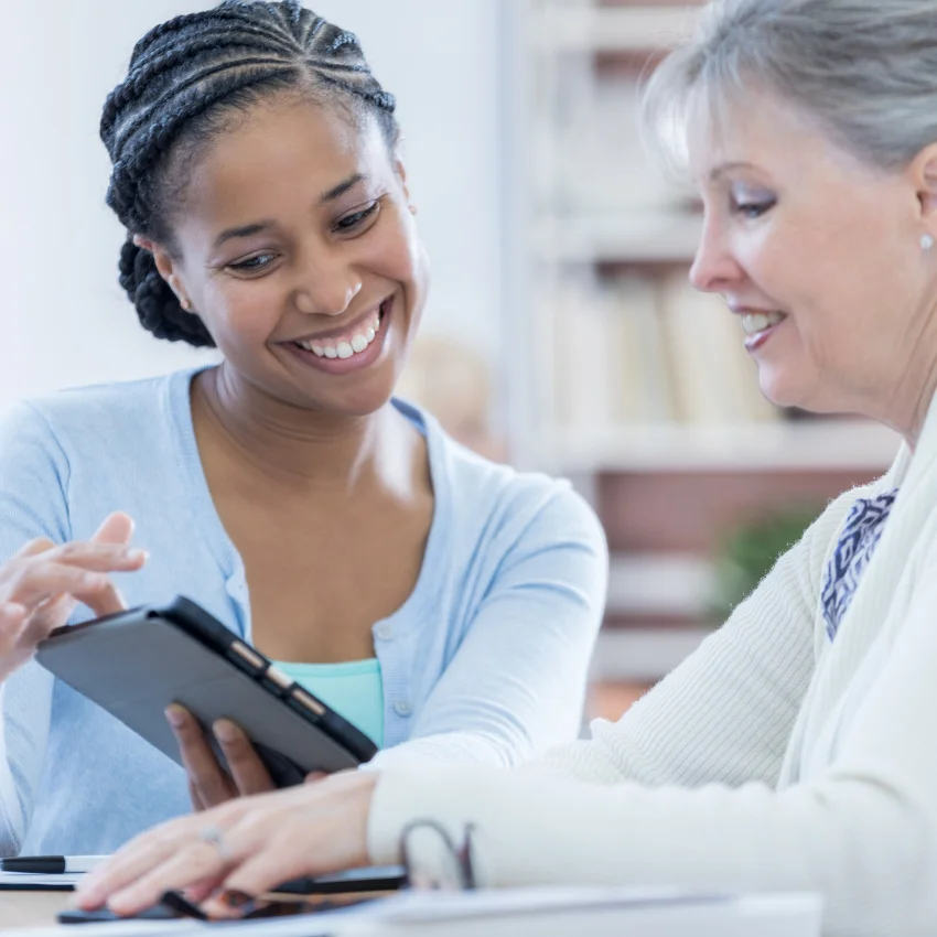 gen x woman investing her money with banker